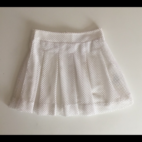 Banana Republic Dresses & Skirts - Banana Republic Petites perforated mini skirt.